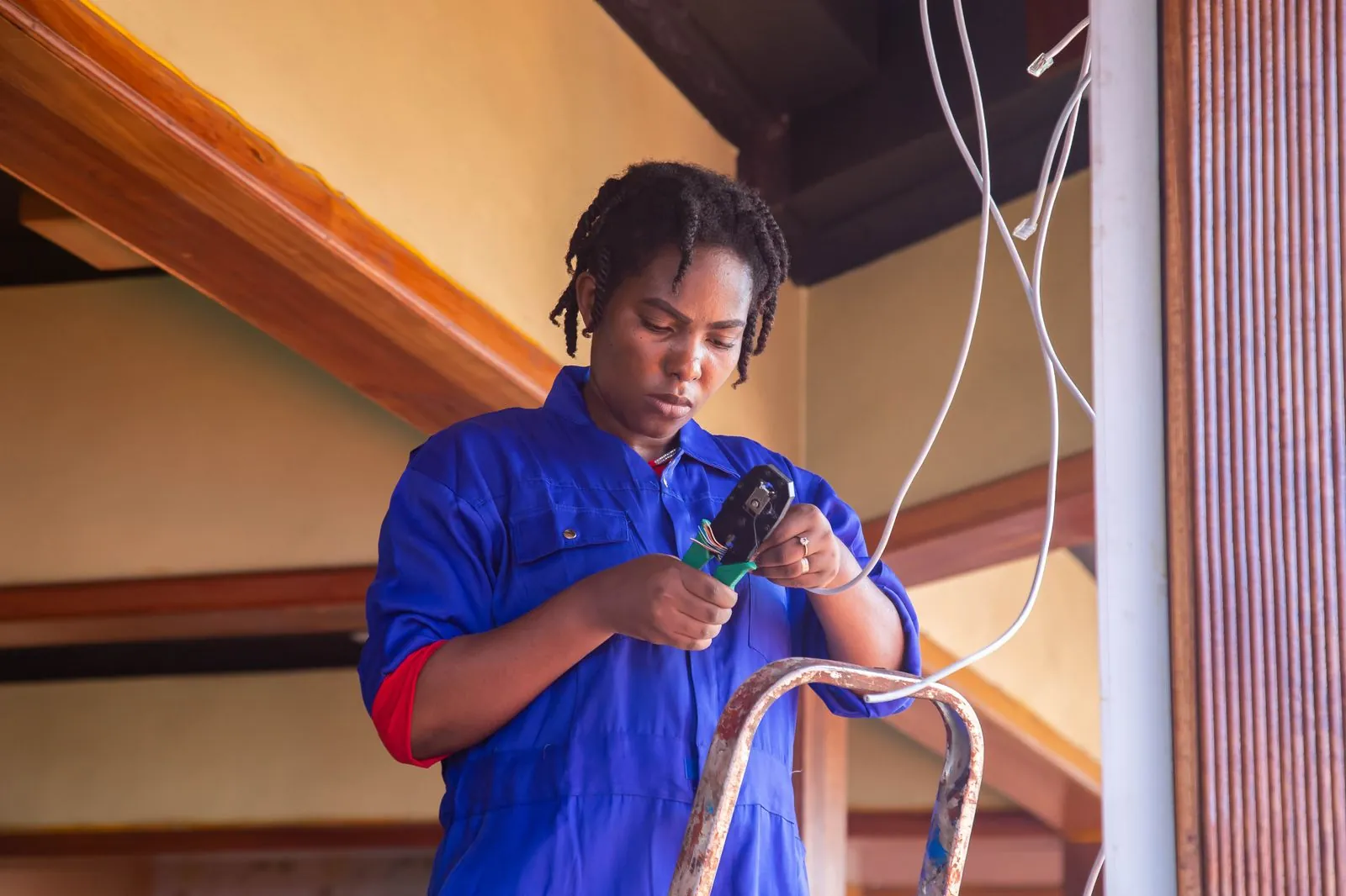 An electrician working on domestic wiring