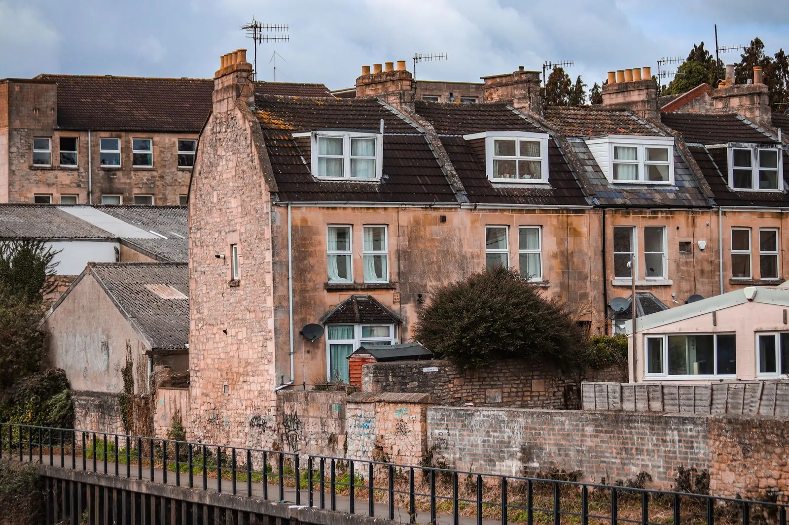 Rooftops and chimneys of terraced houses in a UK town